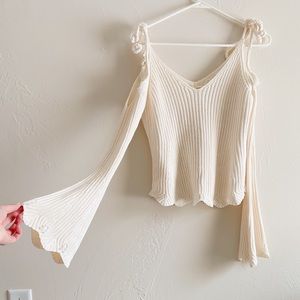 Cream shoulder less long sleeve sweater